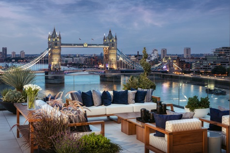 Rooftop terrace overlooking the Thames and Tower Bridge at dusk